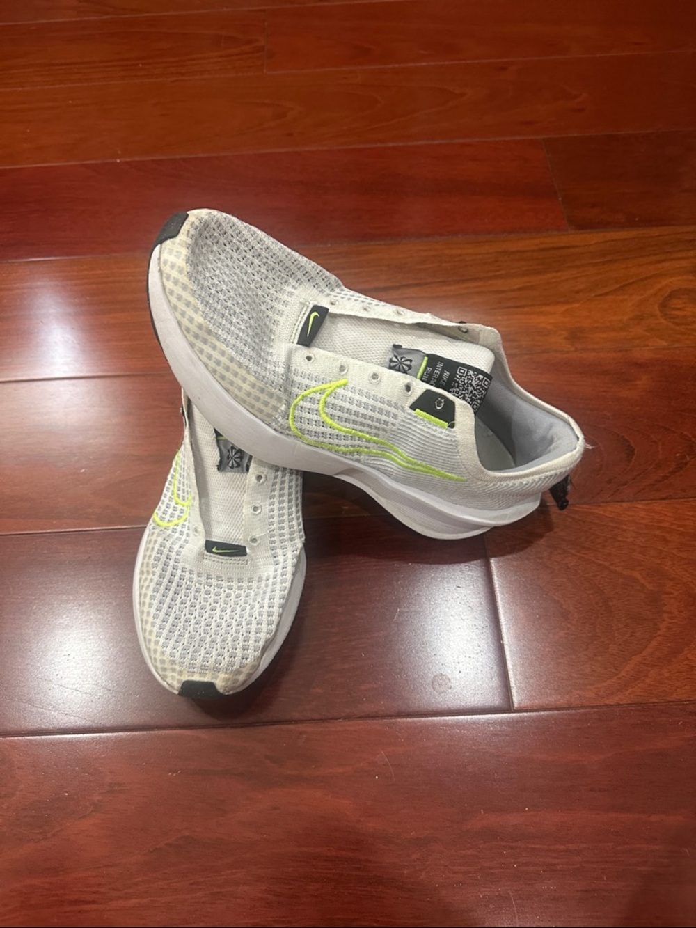 Nike White Running Sneakers with Neon Yellow Swoosh